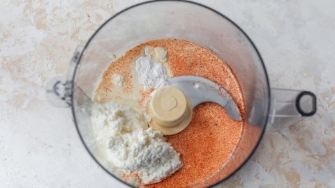 Ingredients for cottage cheese mac and cheese sauce in food processor.
