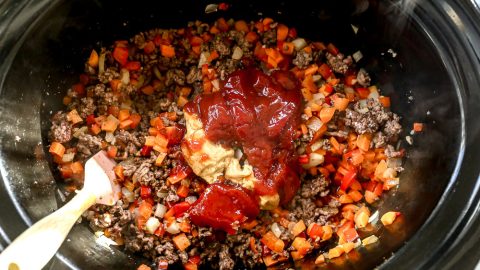 Ingredients for sloppy joes added to crockpot.