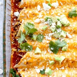 Breakfast enchiladas in casserole dish.