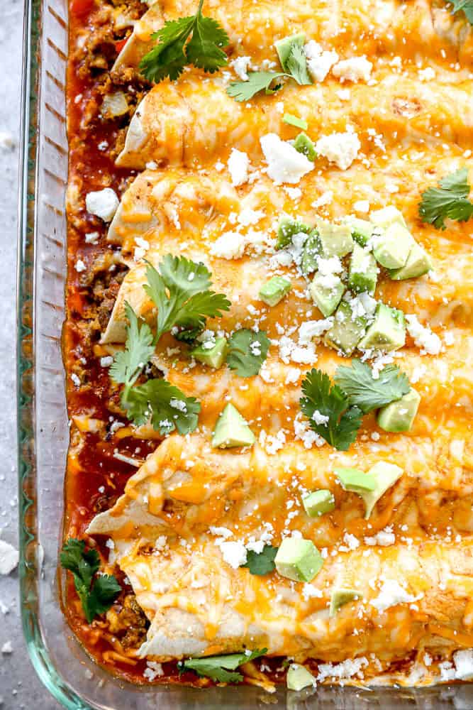 Breakfast enchiladas in casserole dish.