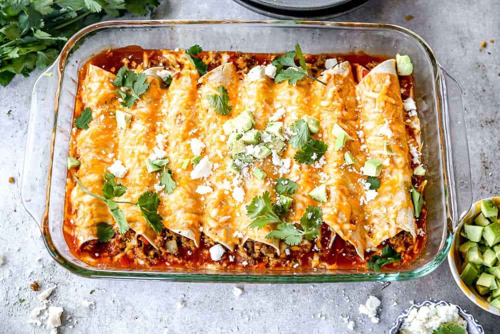 Breakfast enchiladas baked in casserole dish.