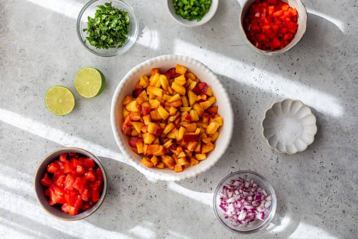 Ingredients for homemade peach salsa.